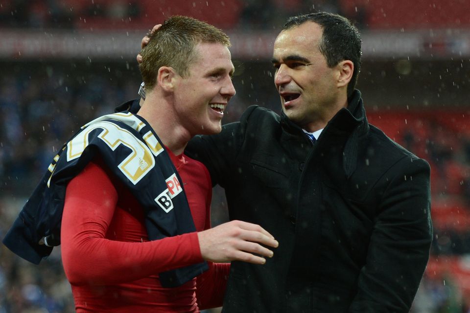 Roberto Martinez celebrates with James McCarthy after Wigan booked their place in the 2013 FA Cup final where they would stun Manchester City